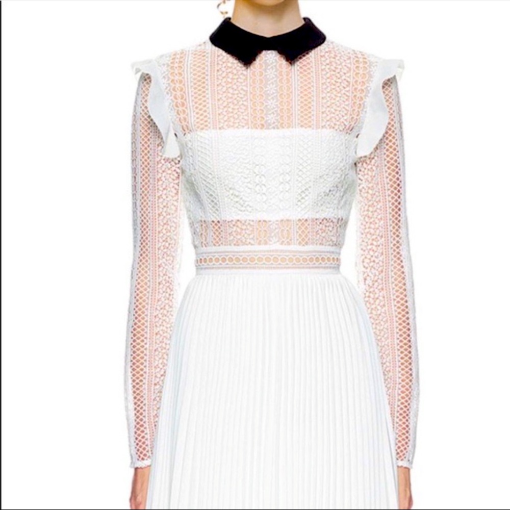 Self-portrait white gown with black collar .